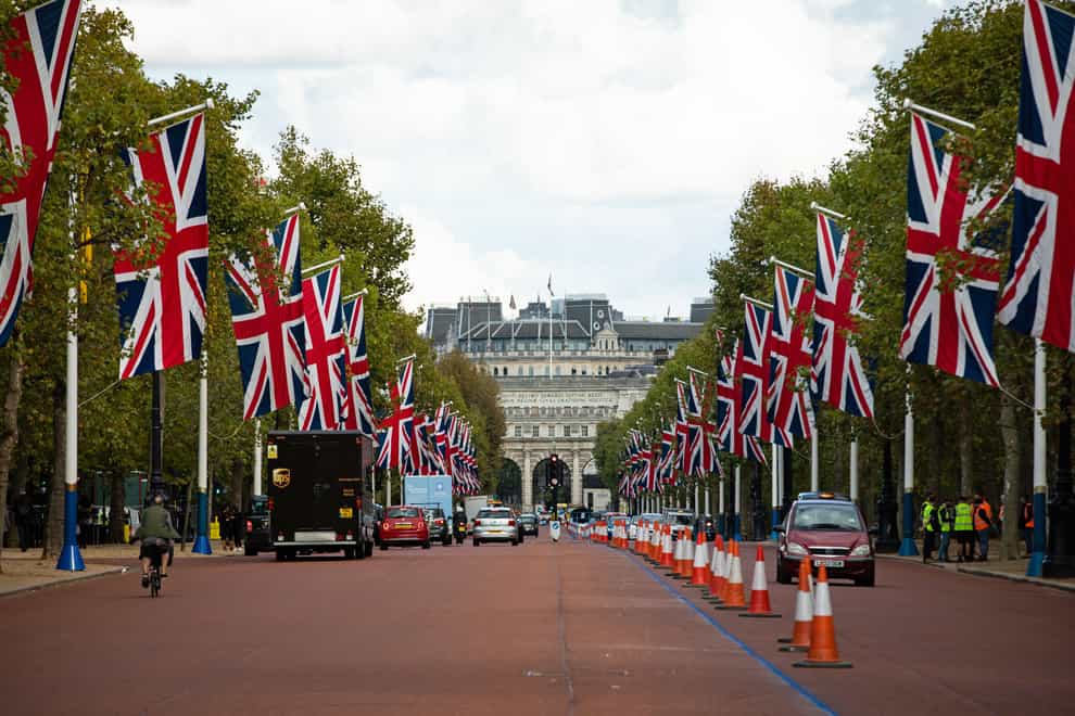 Union flags line The Mall on the route of the 2020 London Marathon (Aaron Chown/PA)