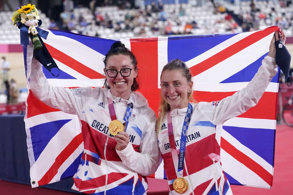 Great Britain’s Katie Archibald, left, and Laura Kenny celebrate with their gold medals after winning the women’s Madison final (Danny Lawson/PA)