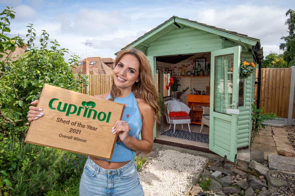Cuprinol Shed of the Year winner Danielle Zarb-Cousin with her 70s-inspired cocktail bar (Cuprinol Shed of the Year/PA)
