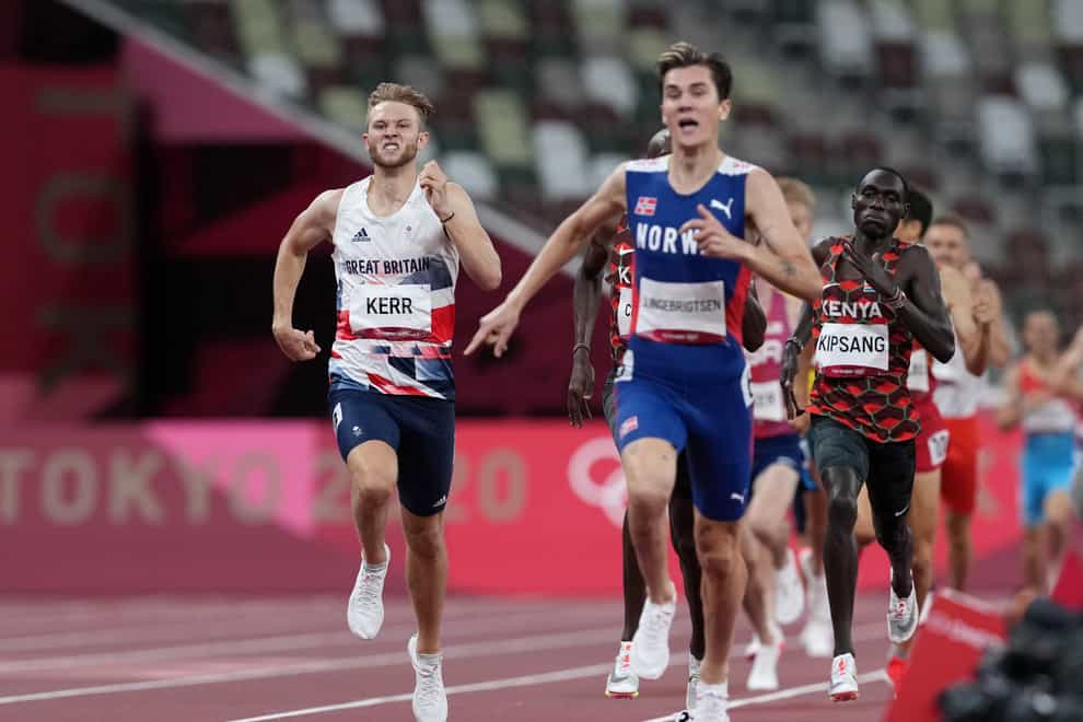 Great Britain’s Josh Kerr (left) races to the line to win bronze in the 1500 metres (Martin Rickett/PA)