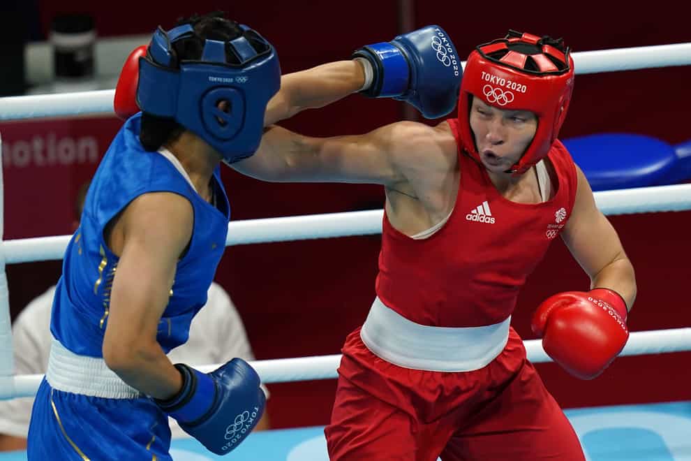 Lauren Price (right) en route to middleweight gold, one of six medals won by the GB boxing squad in Tokyo (Adam Davy/PA Images).