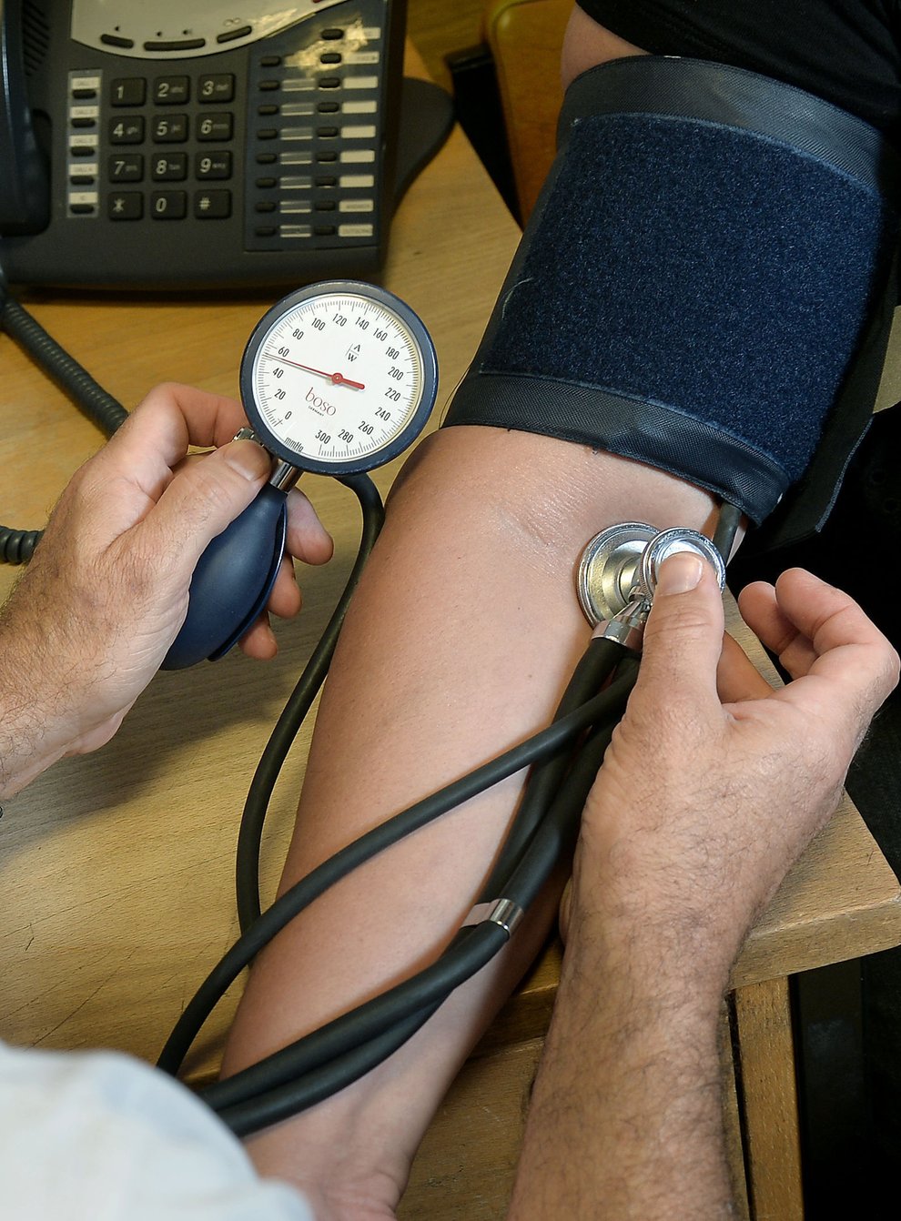 A patient has their blood pressure checked (PA)