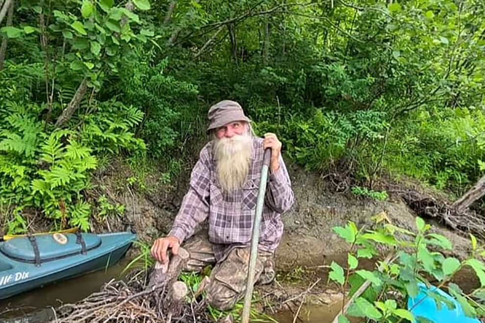 David Lidstone, 81, in the woods of Canterbury, New Hampshire (Jodie Gedeon via AP)