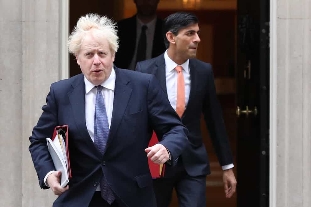 Boris Johnson and Rishi Sunak leaving 10 Downing Street (Jonathan Brady/PA)