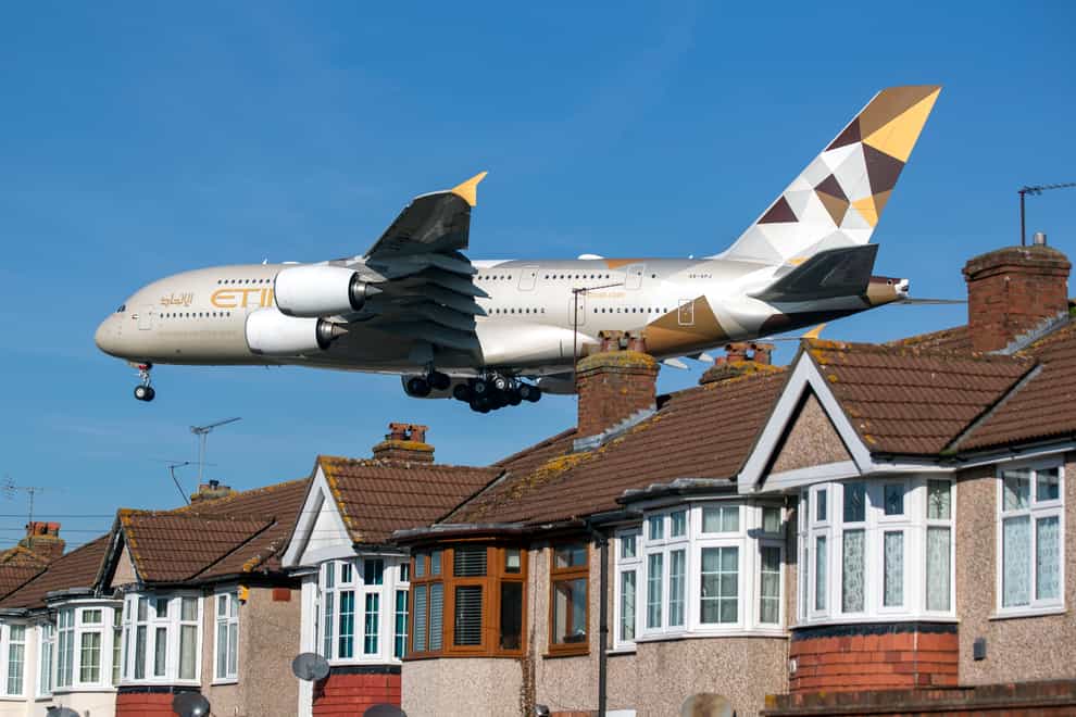 A Etihad Airways Airbus A380 plane comes into land at Heathrow Airport (Steve Parsons/PA)