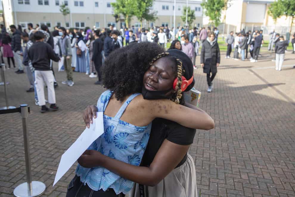 Students celebrate at Brampton Manor Academy in London (Rick Findler/PA)