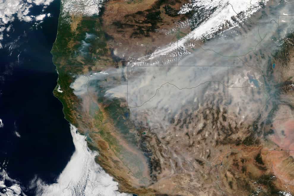 A satellite image of the Dixie Fire burning in northern California (Satellite image ©2021 Maxar Technologies/AP)