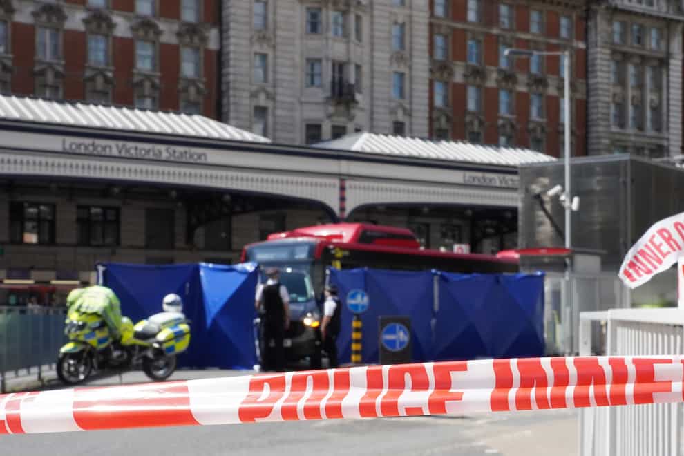 Police at the scene of the crash at Victoria bus station, central London (Ian West/PA)