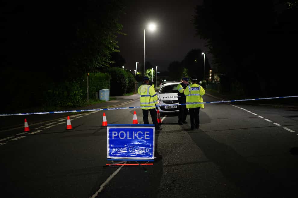 A police cordon on Royal Navy Avenue, near the scene of an incident in the Keyham area of Plymouth, where Devon and Cornwall Police say there have been a “number of fatalities” in a “serious firearms incident”. As many as six people are feared to have died, with several other casualties receiving treatment, after witnesses described hearing gunshots on Thursday evening. Picture date: Thursday August 12, 2021.