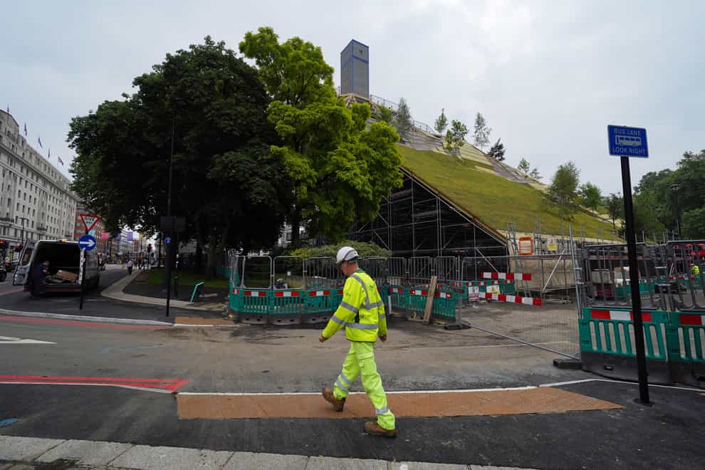 The deputy leader of one of London’s councils has resigned after the total costs for a 25-metre man-made mountain in the middle of one of the capital’s busiest tourist areas nearly doubled to £6m (Jonathan Brady/PA)