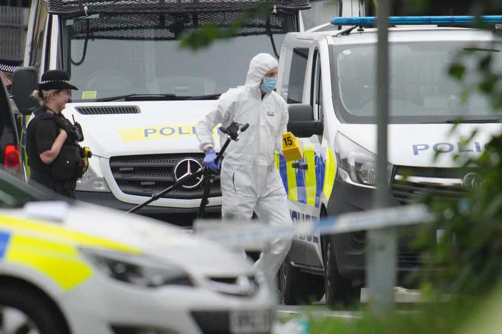 Police at the scene on Friday morning (Ben Birchall/PA)