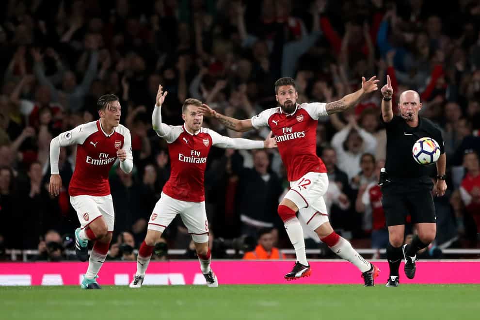 Olivier Giroud (third from left) celebrates scoring Arsenal’s winner in a 4-3 opening day win over Leicester in 2017 (Nick Potts/PA Images).