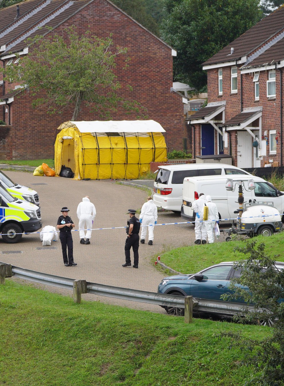 Forensic officers in Biddick Drive in the Keyham area of Plymouth (Ben Birchall/PA)
