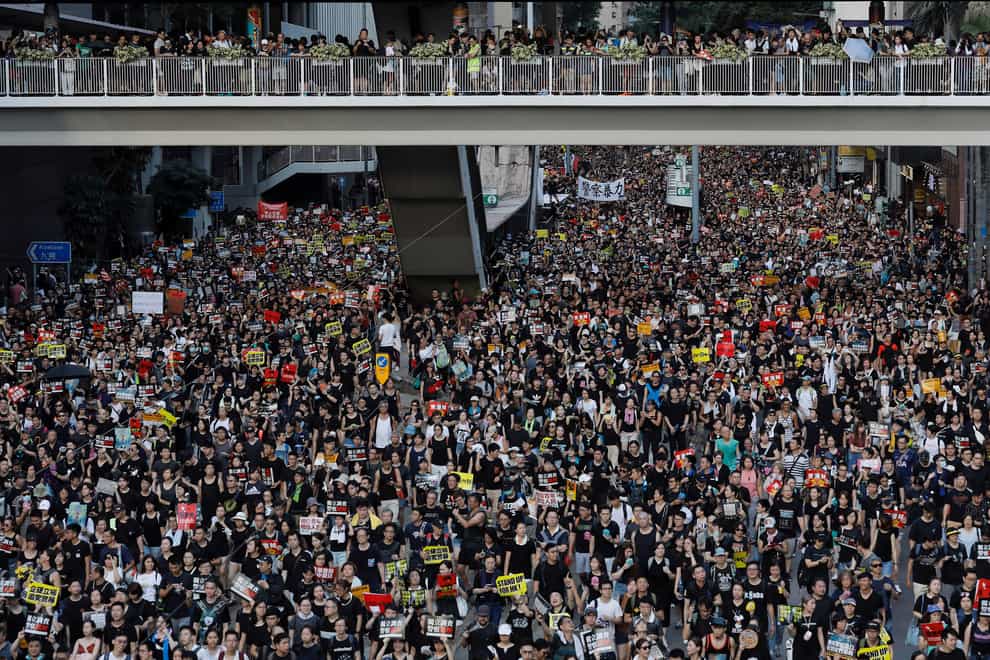 Protesters take part in a rally in Hong Kong (Vincent Yu/AP)
