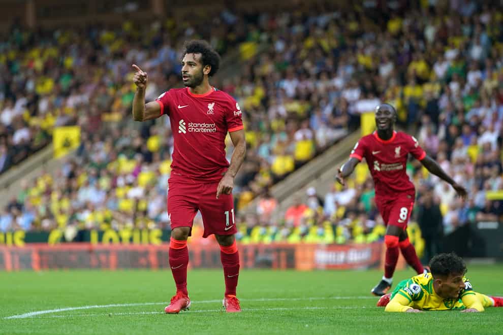 Mohamed Salah scored and assisted two goals in Liverpool’s 3-0 win at Norwich (Joe Giddens/PA)