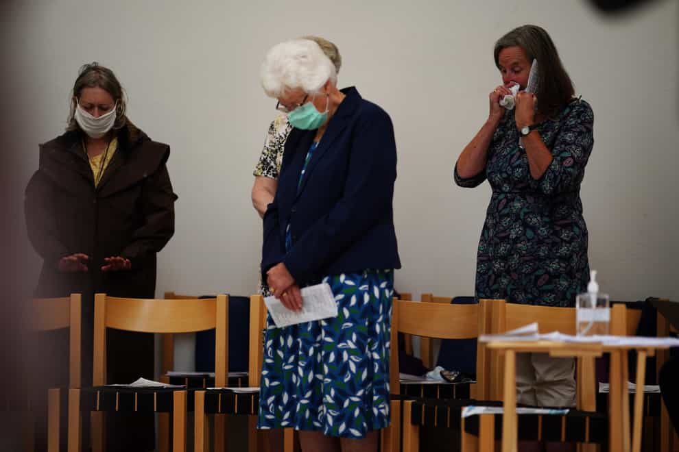 People attend a service at St Thomas’ Church in Keyham (Ben Birchall/PA)