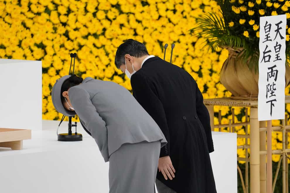 Japan’s Emperor Naruhito (right) and Empress Masako bow during a ceremony to mark the 76th anniversary of Japan’s surrender (Toru Hanai/Pool Photo via AP)