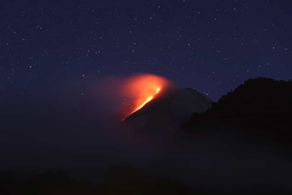 Hot lava runs down from the crater of Mount Merapi in Sleman, Yogyakarta, Indonesia (Trisnadi/AP)