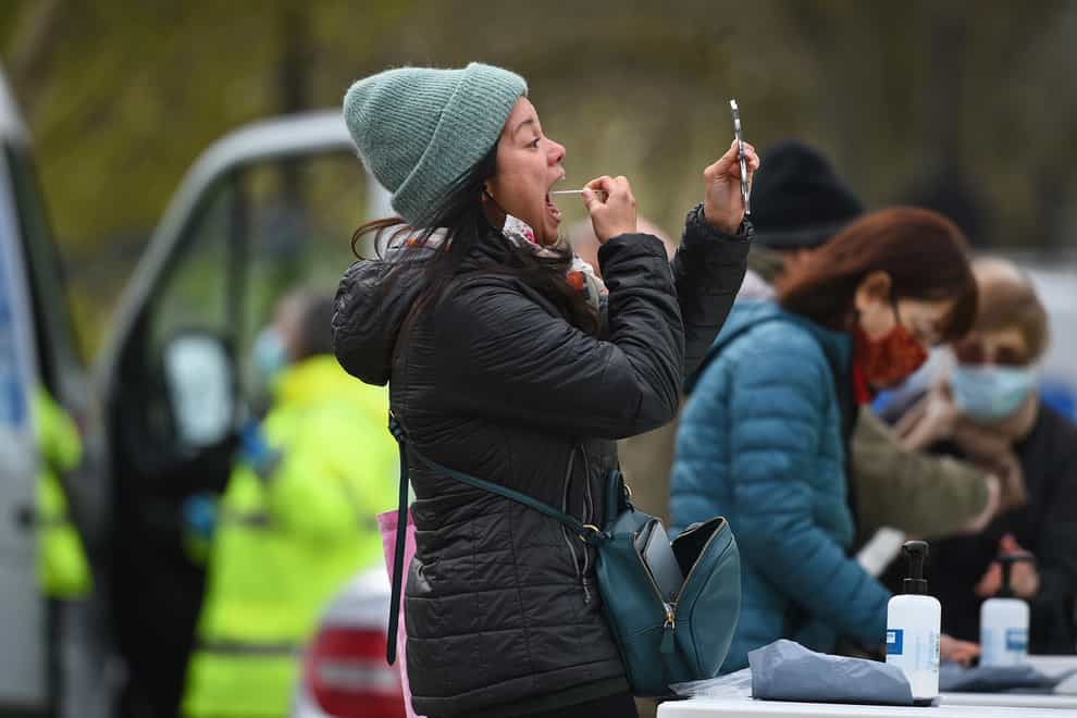 People take part in coronavirus surge testing on Clapham Common, south London (Kirsty O’Connor/PA)