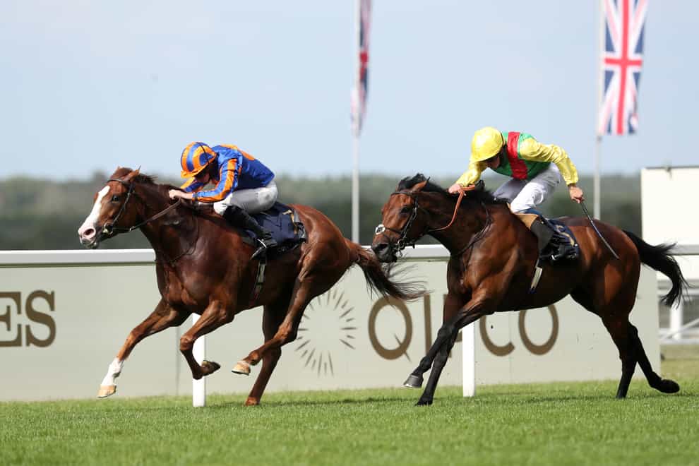 Love and Ryan Moore (left) coming home to win the Prince Of Wales’s Stakes ahead of Audarya (David Davies/PA)