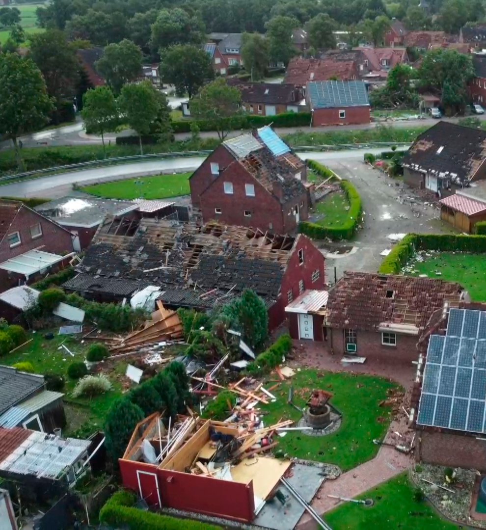 Several houses are damaged by a storm in the German village of Berumerfehn (Joern Hueneke/TNN/dpa via AP)