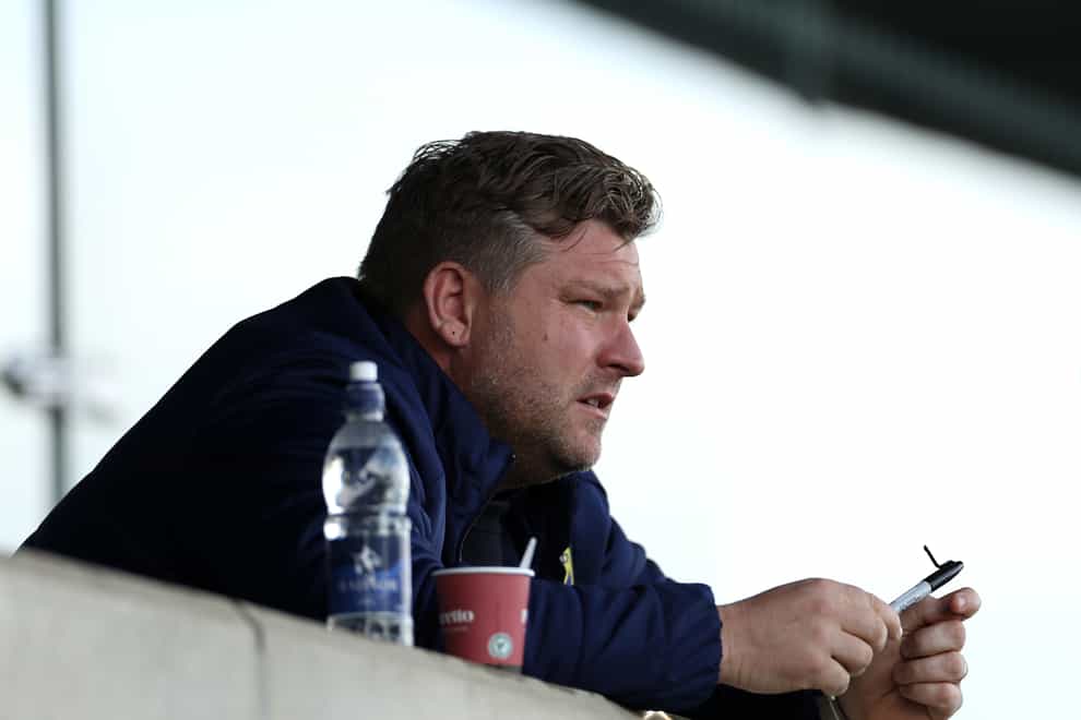 Karl Robinson is worried about injuries (Bradley Collyer/PA)