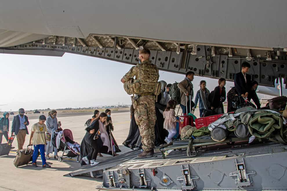 British citizens boarding an RAF aircraft at Kabul airport (Ben Shread/MoD/PA)