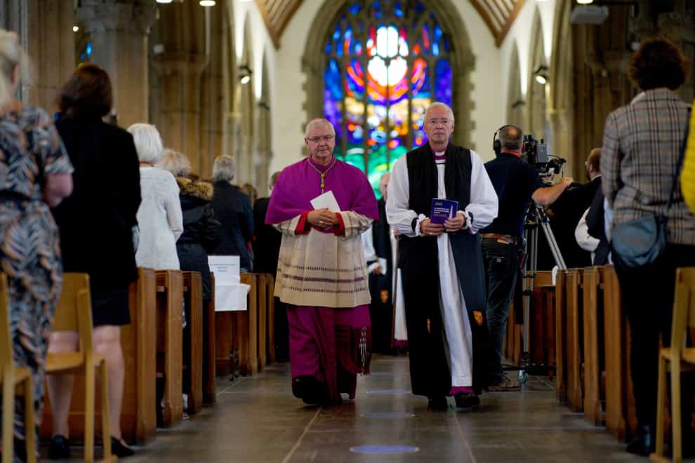 Bishop Mark O’Toole (left) and the Right Reverend Nick McKinnel, the two Bishops of Plymouth, during a civic service at Minister Church Of St Andrew, to remember the five people who were killed by gunman Jake Davison in a firearms incident on Thursday evening (Ben Birchall/PA)