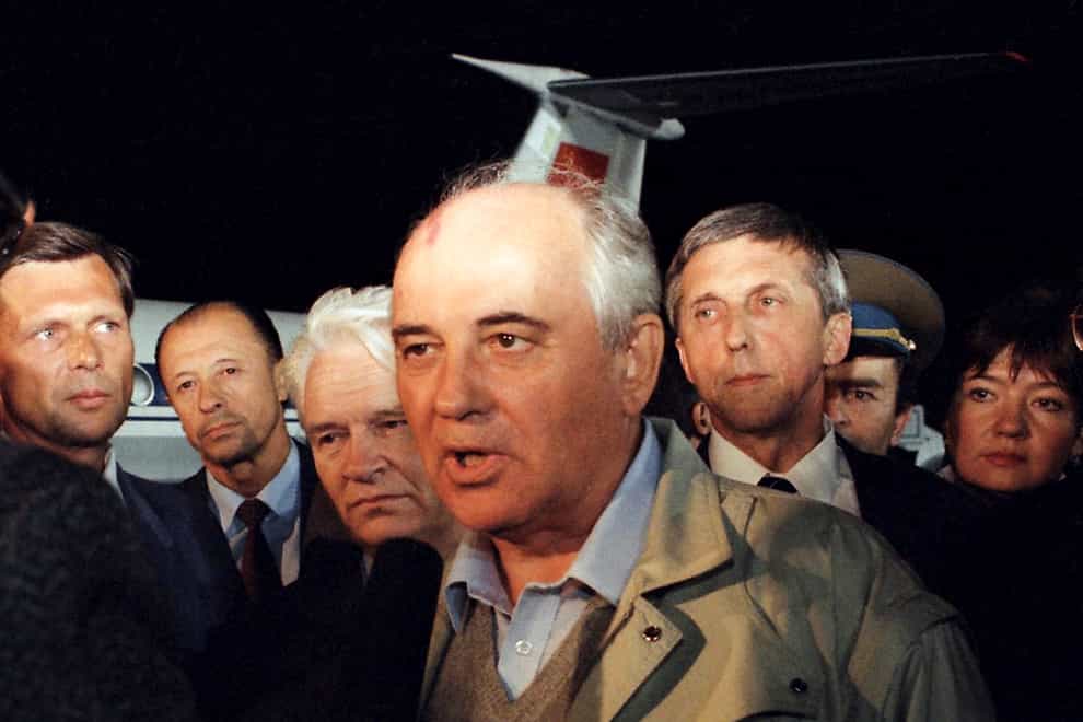 Soviet President Mikhail Gorbachev speaks to a Soviet TV newsman at Vnukovo airport outside Moscow, shortly after arriving from the Crimea after a three day coup by Communist hardliners failed, in Russia (AP)