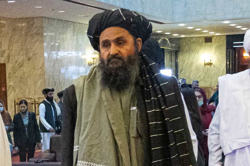 Taliban co-founder Mullah Abdul Ghani Baradar, arrives with other members of the Taliban delegation for an international peace conference in Moscow, Russia (Alexander Zemlianichenko/AP)