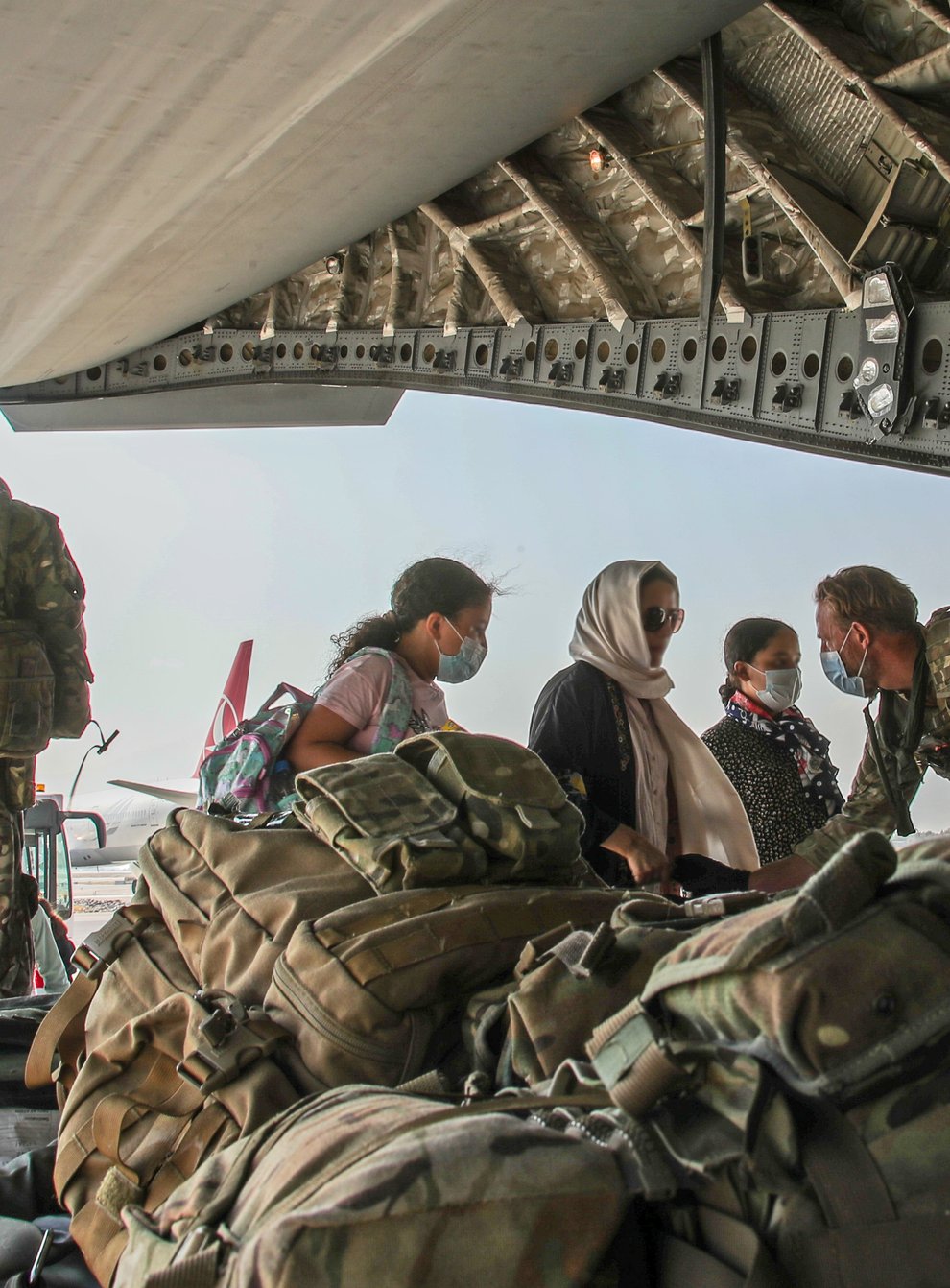 British citizens and dual nationals board a RAF flight out of Kabul (LPhot Ben Shread/MoD/PA)