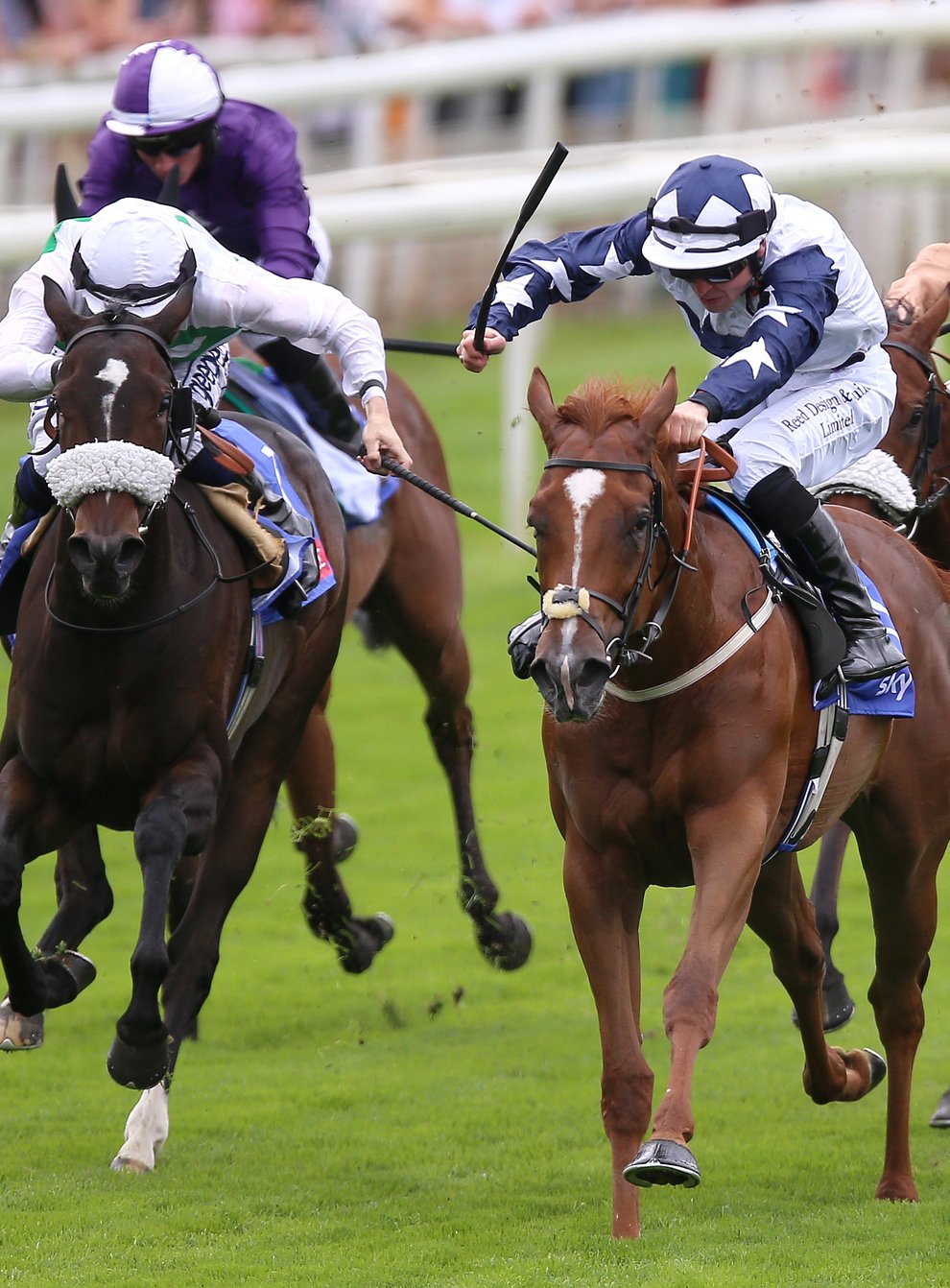 Zain Claudette and Ray Dawson (centre) coming home to win the Sky Bet Lowther Stakes (Nigel French/PA)