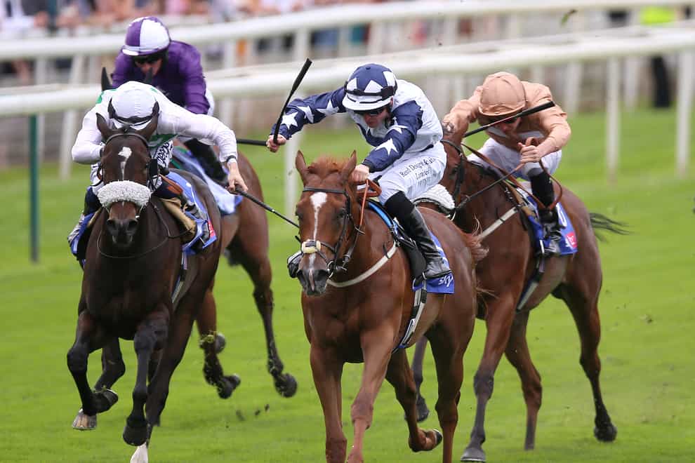 Zain Claudette and Ray Dawson (centre) coming home to win the Sky Bet Lowther Stakes (Nigel French/PA)