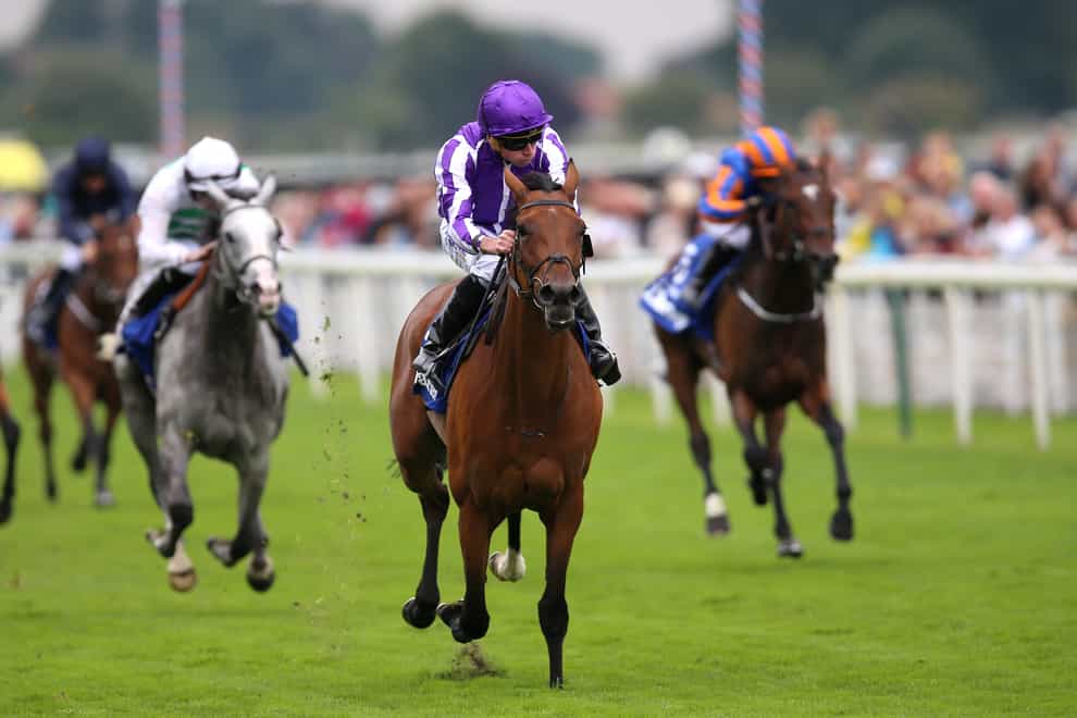 Snowfall and Ryan Moore coming home to win the Darley Yorkshire Oaks (Nigel French/PA Wire)