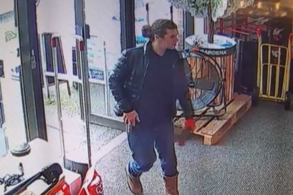 Cheshire Police have released a CCTV image of a man they want to speak to in connection with the theft of the phone box (Cheshire Constabulary/PA)