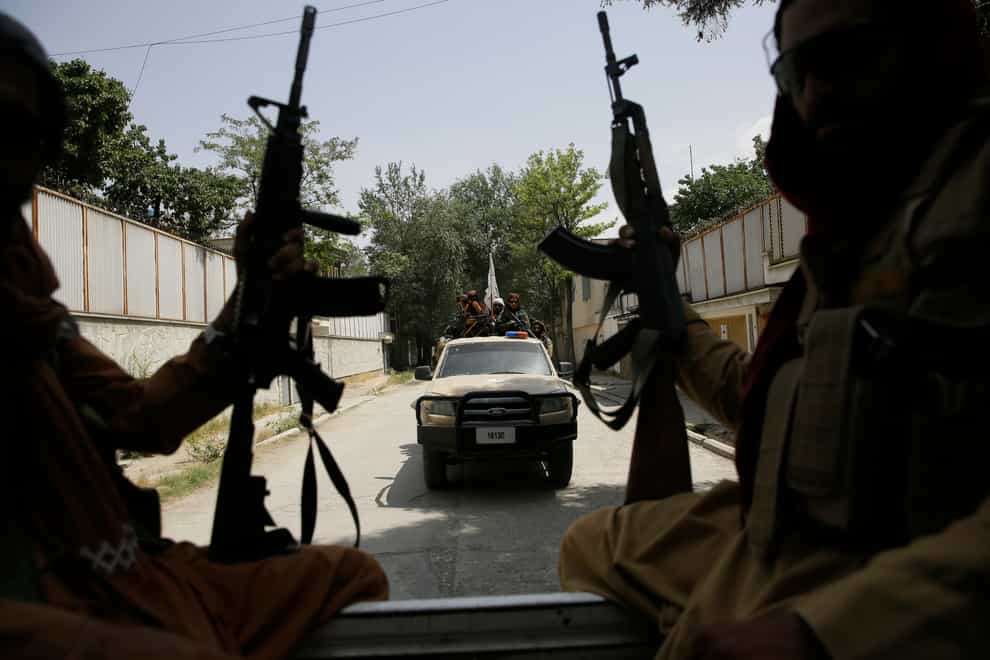 Taliban fighters patrol in Kabul, Afghanistan (Rahmat Gul/AP)