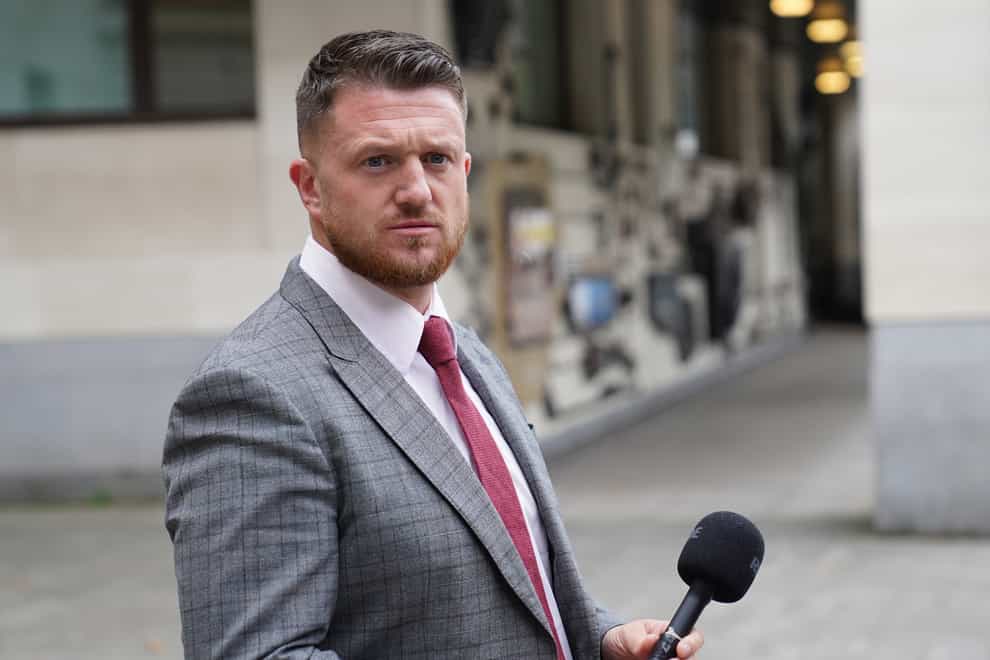 Tommy Robinson outside Westminster Magistrates’ Court, where he is accused of stalking Independent home affairs correspondent Lizzie Dearden, who has applied for a stalking protection order against him (Stefan Rousseau/PA)