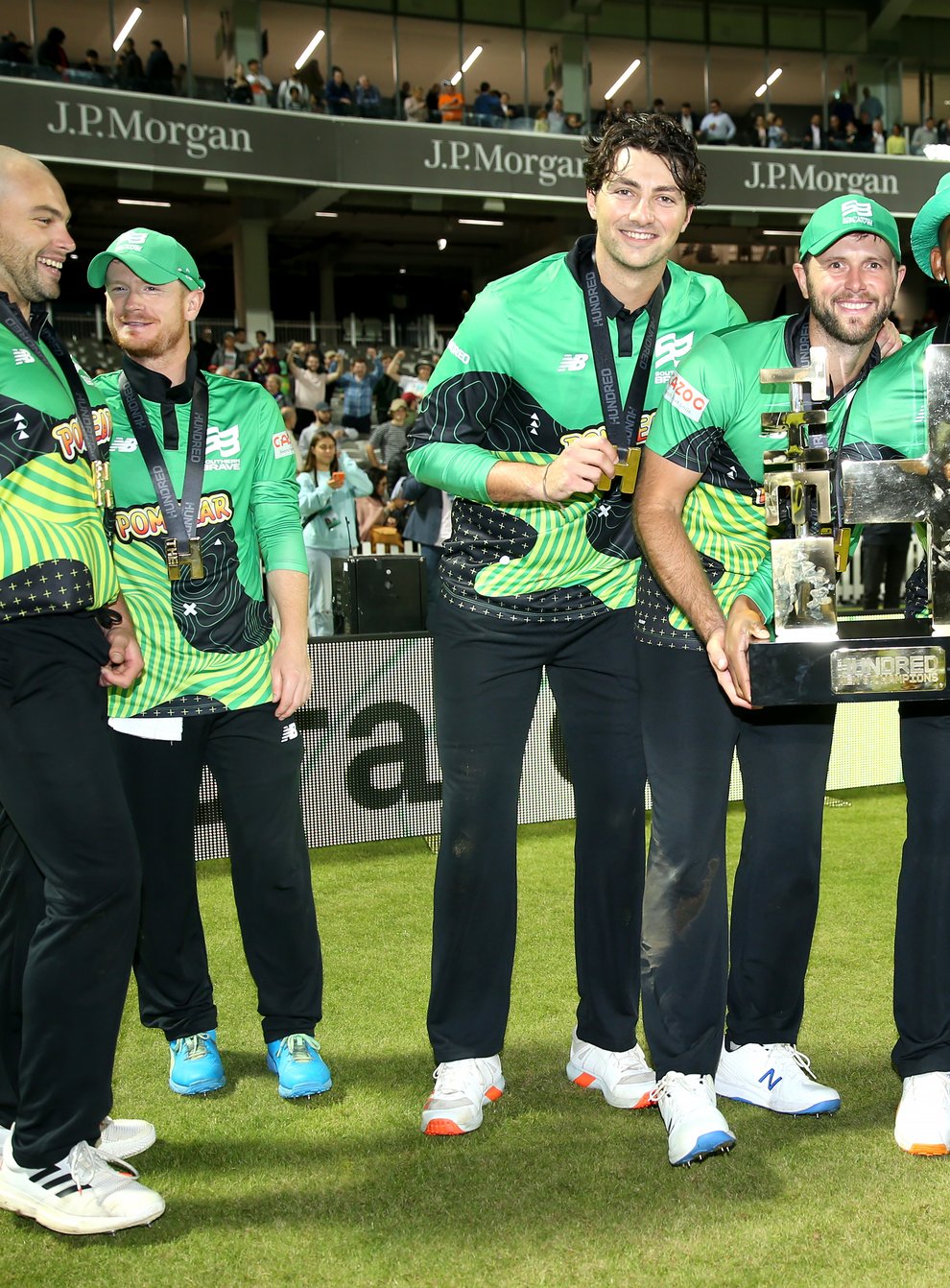 Southern Brave players lift the inaugural Hundred trophy (Steven Paston/PA)