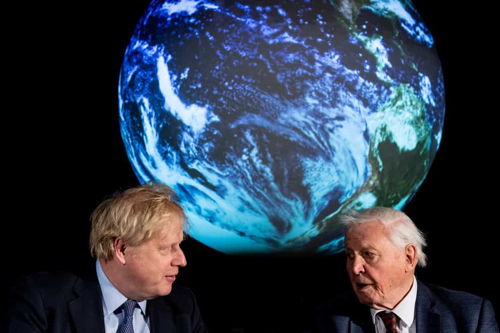 Prime Minister Boris Johnson, left, and Sir David Attenborough at the launch of the Cop26 UN Climate Summit (Chris J Ratcliffe/PA)