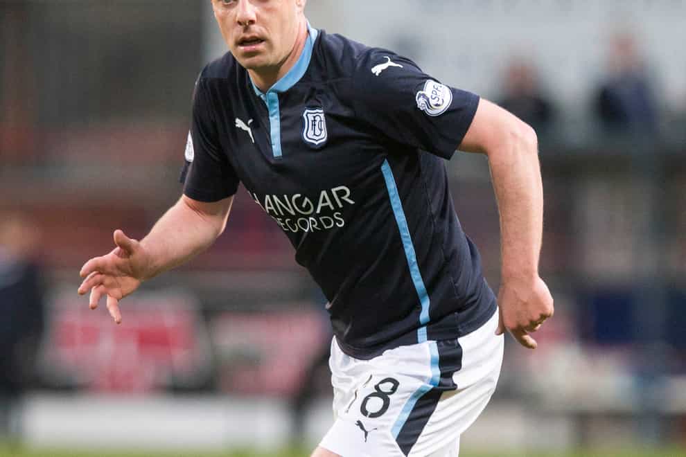 Paul McGowan headed a late equaliser for Dundee against Hibernian (Jeff Holmes/PA Images).