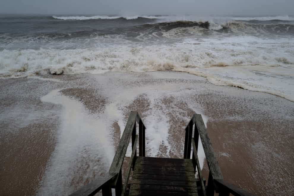 Waves pound the beaches of Montauk as the severe weather system approaches (Craig Ruttle/AP)