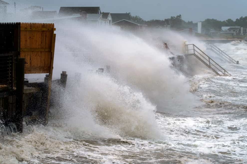 Waves pound a sea wall in Montauk, New York, on Sunday (Craig Ruttle/AP)