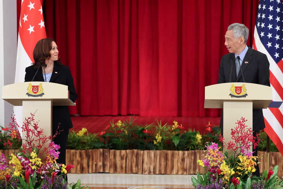 US vice president Kamala Harris, left, and Singapore’s prime minister Lee Hsien Loong (Evelyn Hockstein/AP)