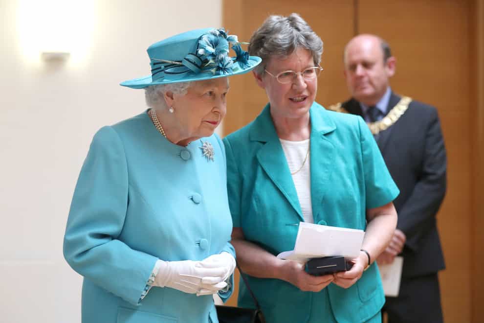 The Queen with Dame Jocelyn Bell Burnell during a previous visit to the Royal Society of Edinburgh (Jane Barlow/PA)