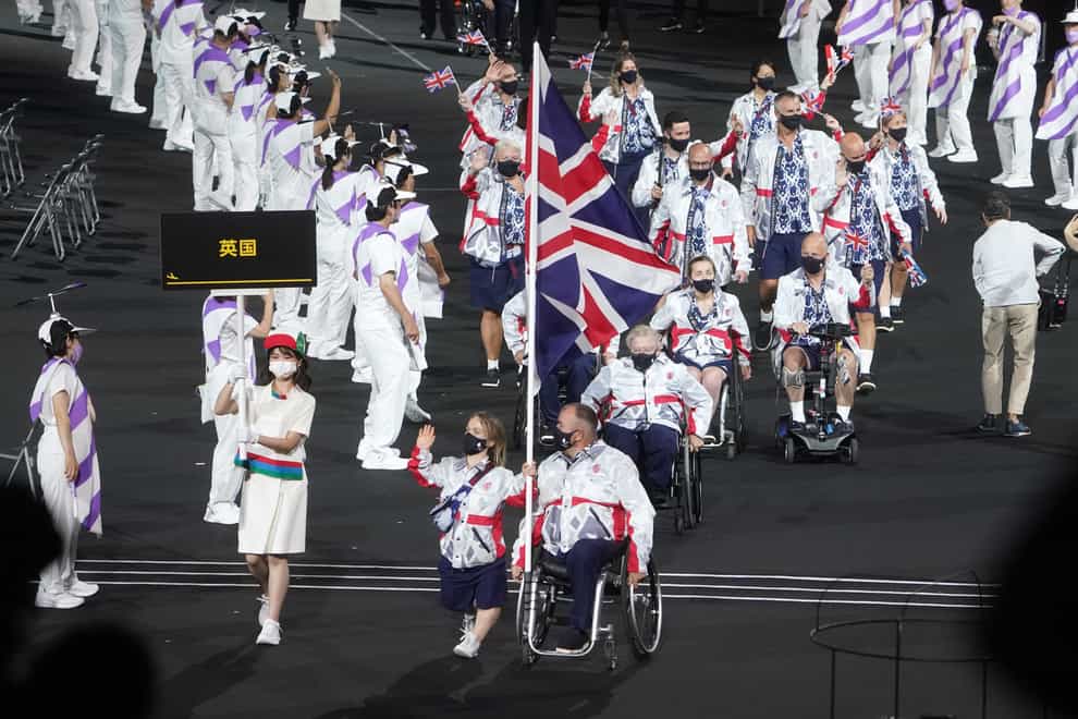 Great Britain flagbearers Ellie Simmonds and John Stubbs during the opening ceremony of the Tokyo 2020 Paralympic Games (PA)