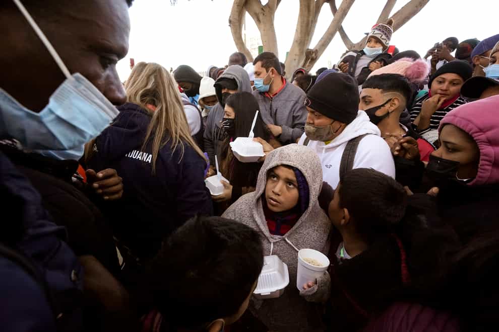 The Supreme Court has refused to block a court ruling ordering Joe Biden’s administration to reinstate a Donald Trump-era policy that forces people to wait in Mexico while seeking asylum in the US (Gregory Bull/AP)
