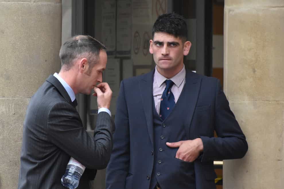 John Finnegan (left) and Rhys Matcham outside Leicester Magistrates’ Court, where they were cleared of breaching the 2004 Hunting Act (PA)
