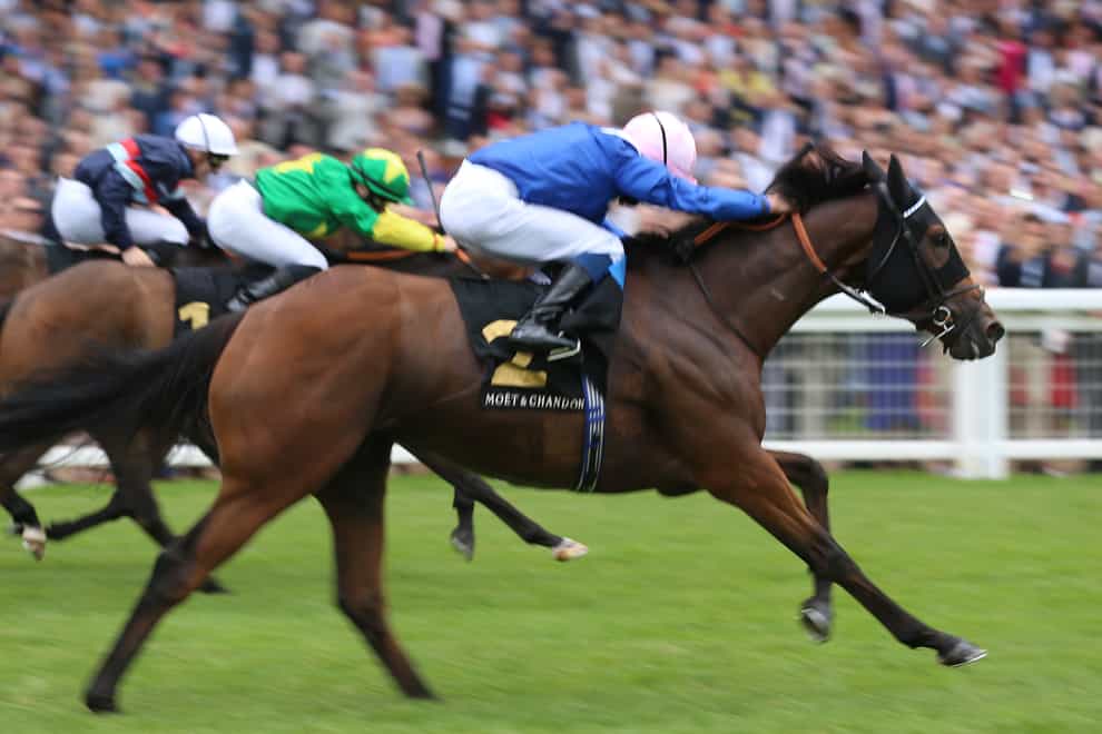 Danyah ridden by jockey William Buick on their way to winning the Moet & Chandon International Stakes during the QIPCO King George Diamond Weekend at Ascot Racecourse (Nigel Kirby/PA)