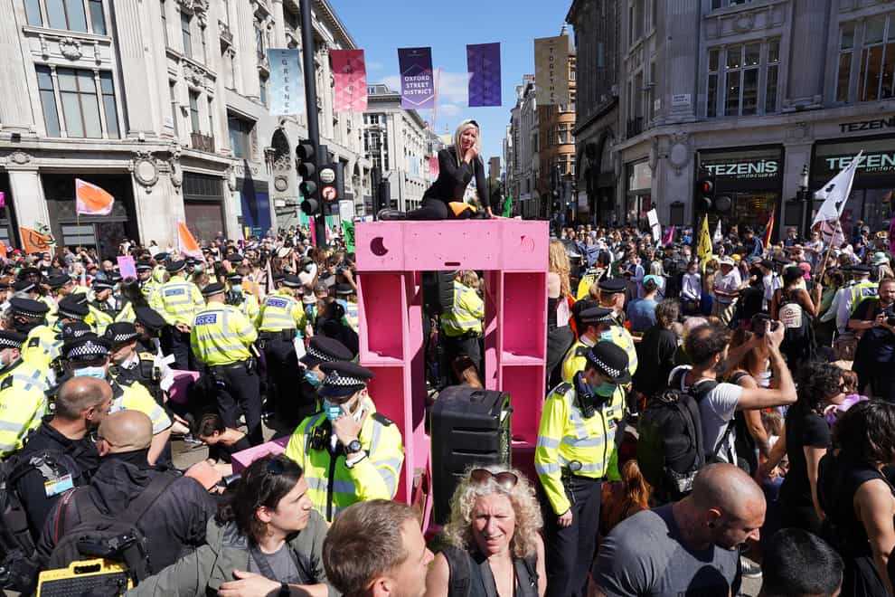 Demonstrators during a protest by Extinction Rebellion at Oxford Circus (Stefan Rousseau/PA)