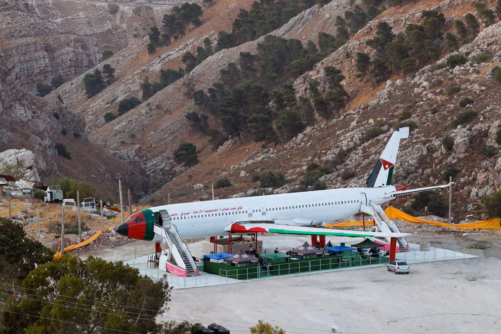 A Boeing 707 aircraft has been converted to a cafe, in Wadi Al-Badhan, just outside the West Bank city of Nablus (Majdi Mohammed/AP)
